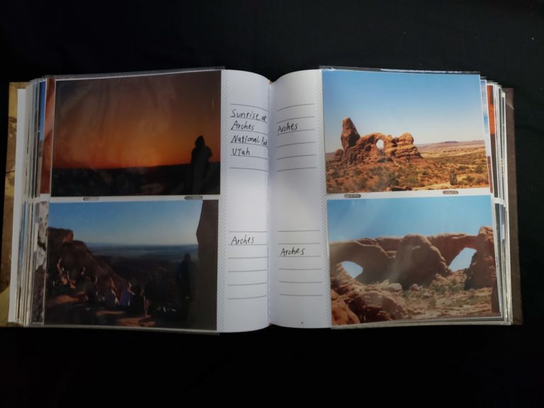 Inside the 6x4 photo album, with 2 pictures on each page and a caption